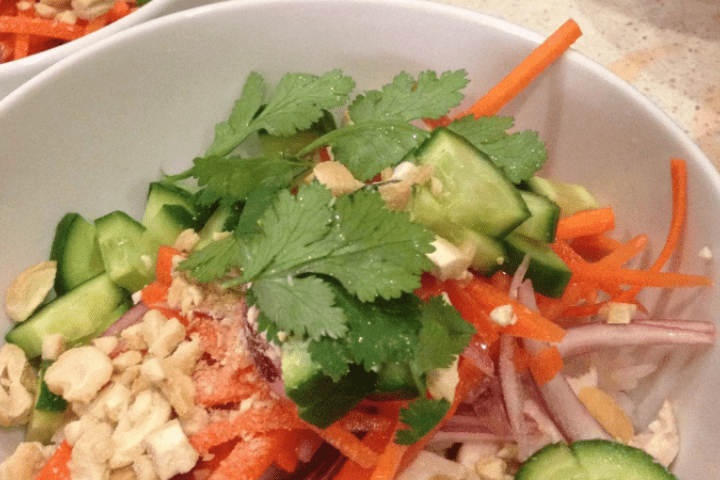 Vietnamese chicken served in a white bowl.