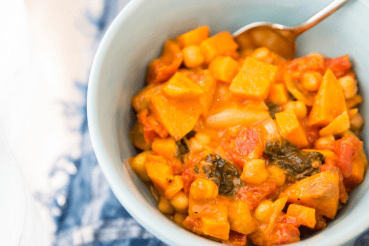 Coconut curry dish in a white bowl