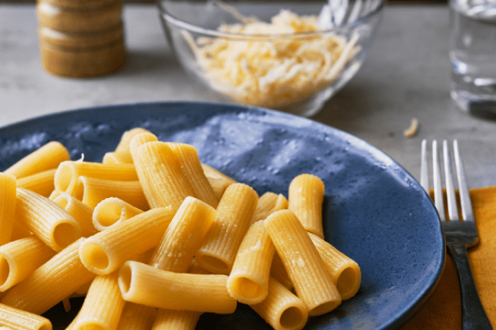 Rigatoni pasta in a blue bowl