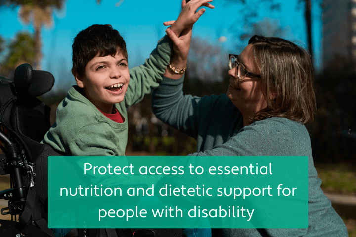 Two people, one in a wheelchair, interacting outdoors with text promoting nutrition support for people with disability