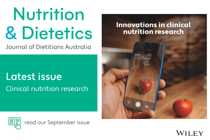 Nutrition & Dietetic Journal. iPhone taking photo of a tomato