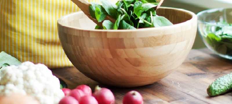 Colourful fruit and vegetables on a kitchen bench
