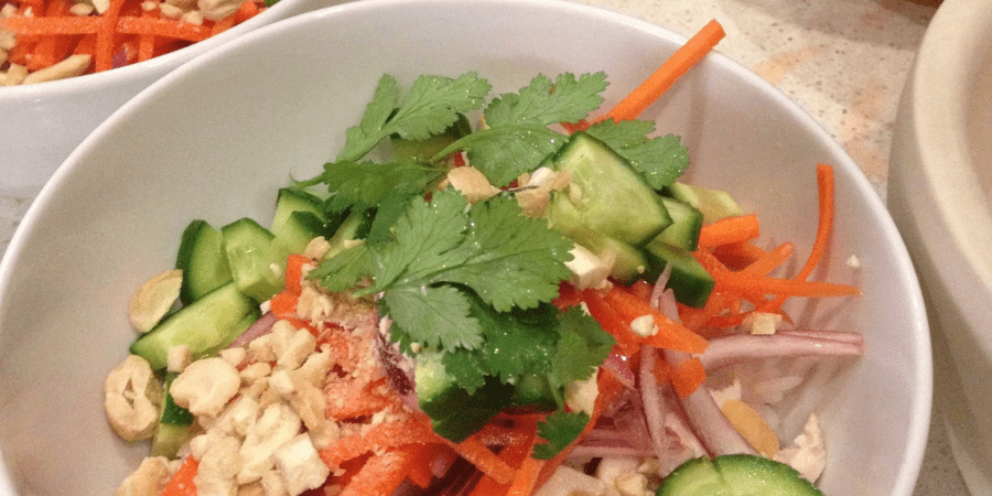 Vietnamese chicken served in a white bowl.