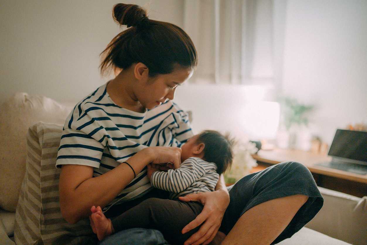 Woman breastfeeding her child