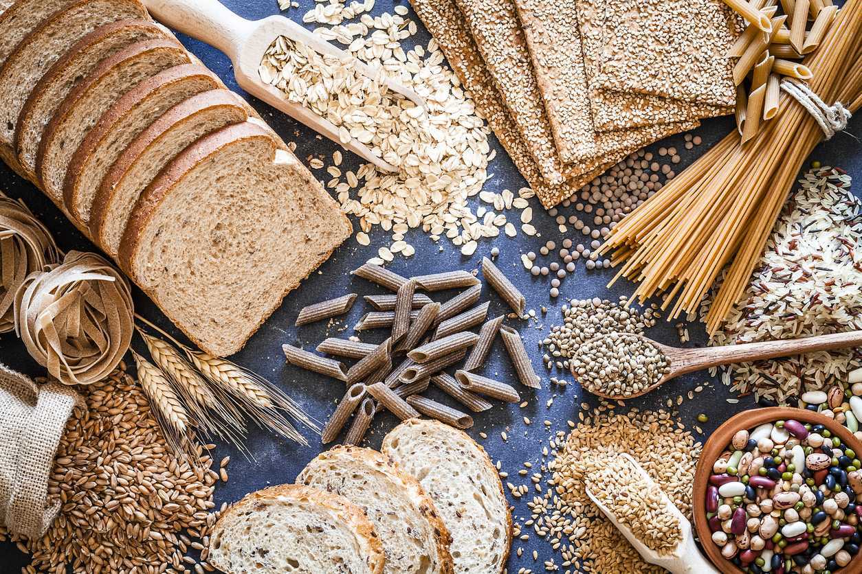 Selection of whole grains including bread and pasta